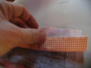 pull-one-side-of-fabric-on-top-of-bead