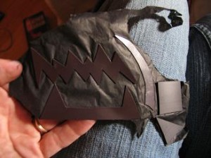 peel-off-white-backing-and-place-the-sticky-side-of-magnet-on-black-tissue-paper