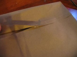 run-a-strip-of-hot-glue-on-end-thats-not-folded