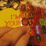 stencil-words-on-wooden-hearts