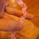 pull-the-thread-to-gather-the-ribbon