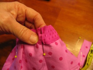 tuck-under-edge-of-ribbon-and-pin