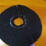 apply hot glue around circle as shown