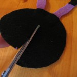 cut a slit halfway into the circle as shown