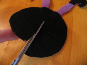 cut a slit halfway into the circle as shown