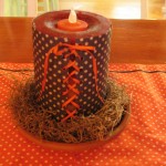 laced up candle cover