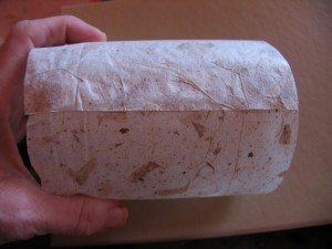 wrap decorative paper around and hot glue