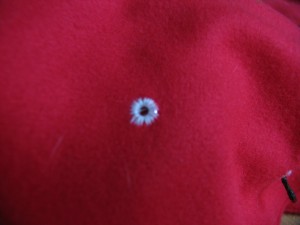 the eyelet will hold the light in place. It should be snug.