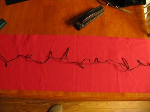 lay out lights on wrong side of scarf