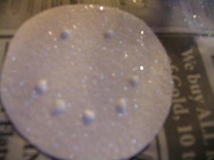make face with dots of glue as shown