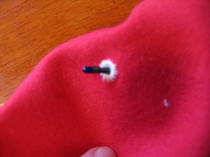 push the lights through the holes. They should fit snugly.