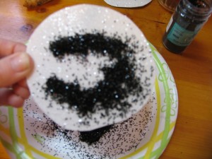 sprinkle on black glitter