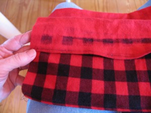 Fold over three inches (right sides together) as shown