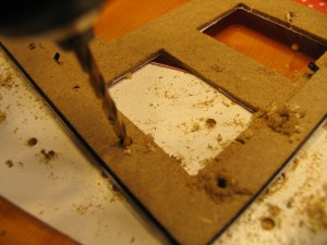 drill holes around edge of frame