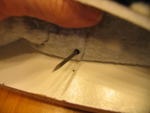 push nail all the way through
