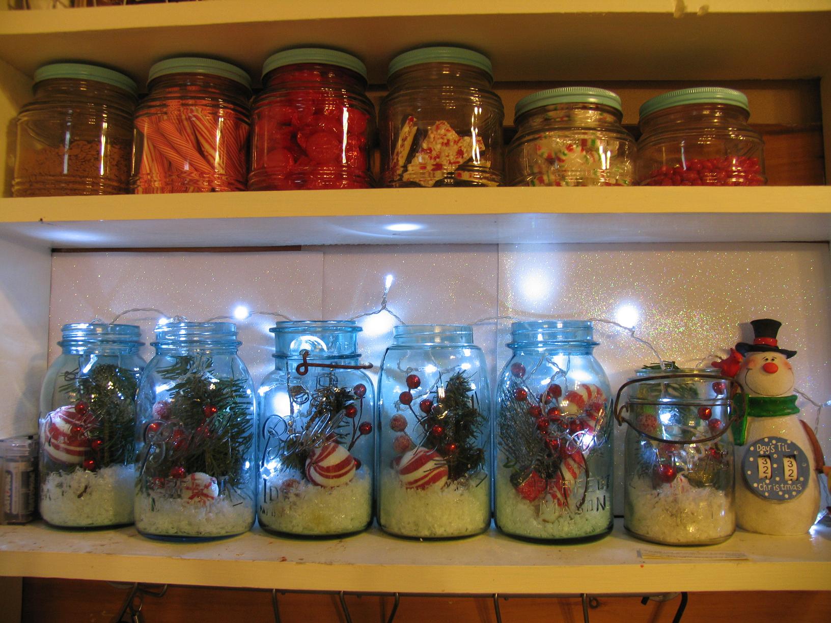 Mason Jars Filled With Christmas Picks Snow And Lights For