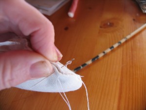 stitch the opening closed after you stuff the head.
