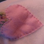 hand stitch all hearts into place. 