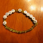 Make a bracelet for child that proclaims the loss of a tooth