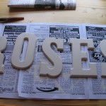 I bought small wooden letters and spelled out roses 