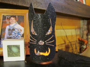 cat candle cover made from black glitter paper