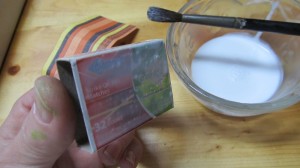 brush glue on outside the box