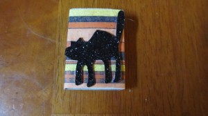 glue on black cat
