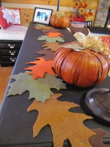 big leaf garland made from felt and fastened with scrapbooking paper fasteners