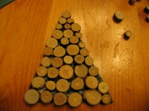 keep adding wood pieces until tree is covered