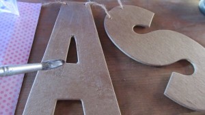 paint glue on the top of each letter