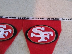 glue each pennant to ribbon as shown