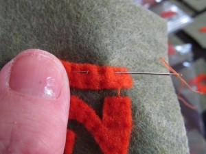I hand stitched my numbers onto each pocket