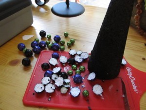 cut the balls in half with a sharp knife or razor blade