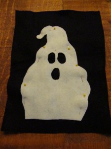 pin ghost to front of bag