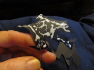 spread glue on one of the witch pieces