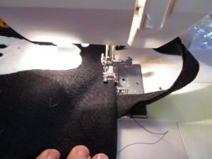 turn facing to inside and stitch along top edge as shown
