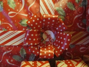 make a little button by punching two holes in the circle