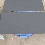 cut board to whatever size you want and then spray with chalkboard paint