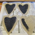 cut heart shapes from burlap and paint with chalkboard paint