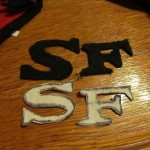 cut out an s and an f from black felt for each piece