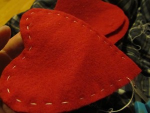 stitch around hearts leaving an opening at the bottom