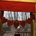 heart garland hanging on window