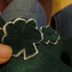 stitch the shamrock to shoe as shown